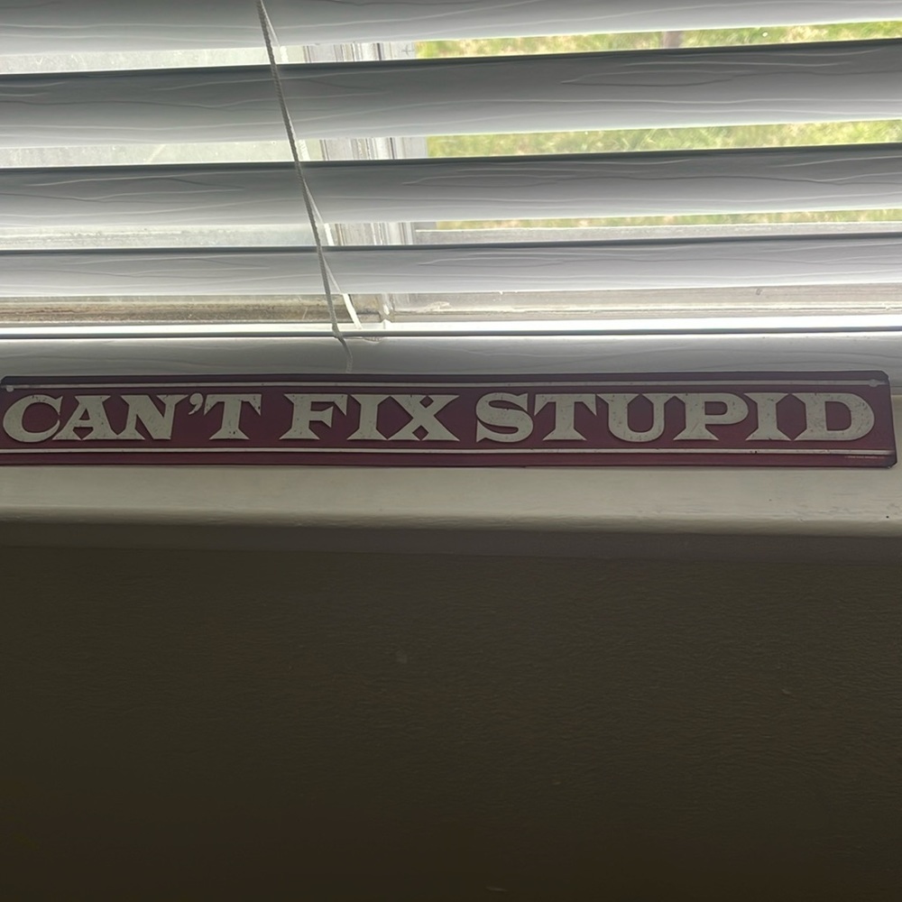 funny “can’t fix stupid” sign